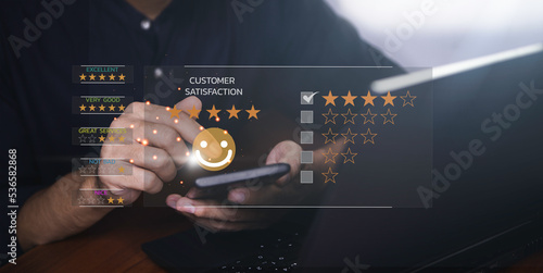 Customer Experience dissatisfied Concept, Unhappy Businessman Client with Sadness Emotion Face on smartphone screen, low rating, bad service dislike bad quality, Bad review, soft focus.