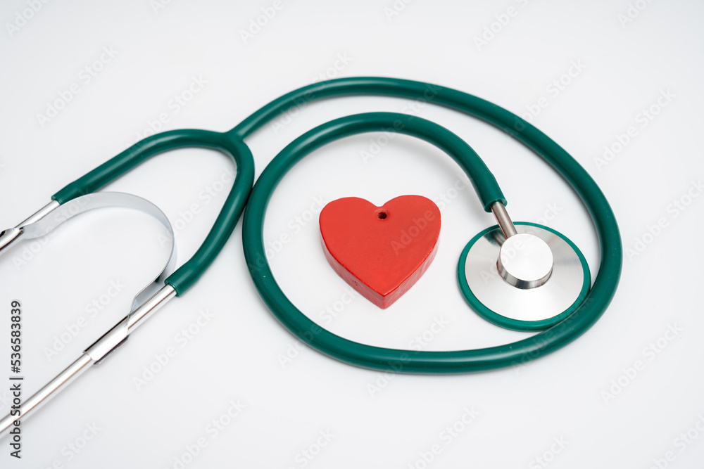 medical stethoscope and red heart on a blue background medical stethoscope and red heart on a blue background