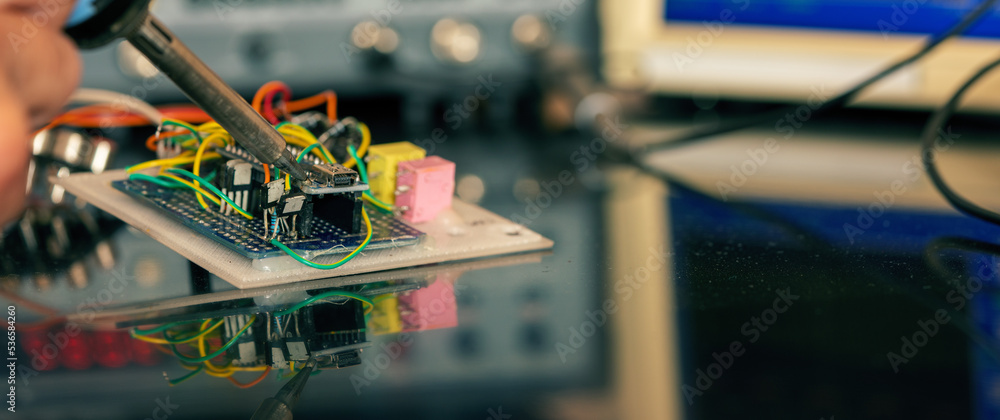 Manufacturing and setting up an electronic device in the laboratory ...