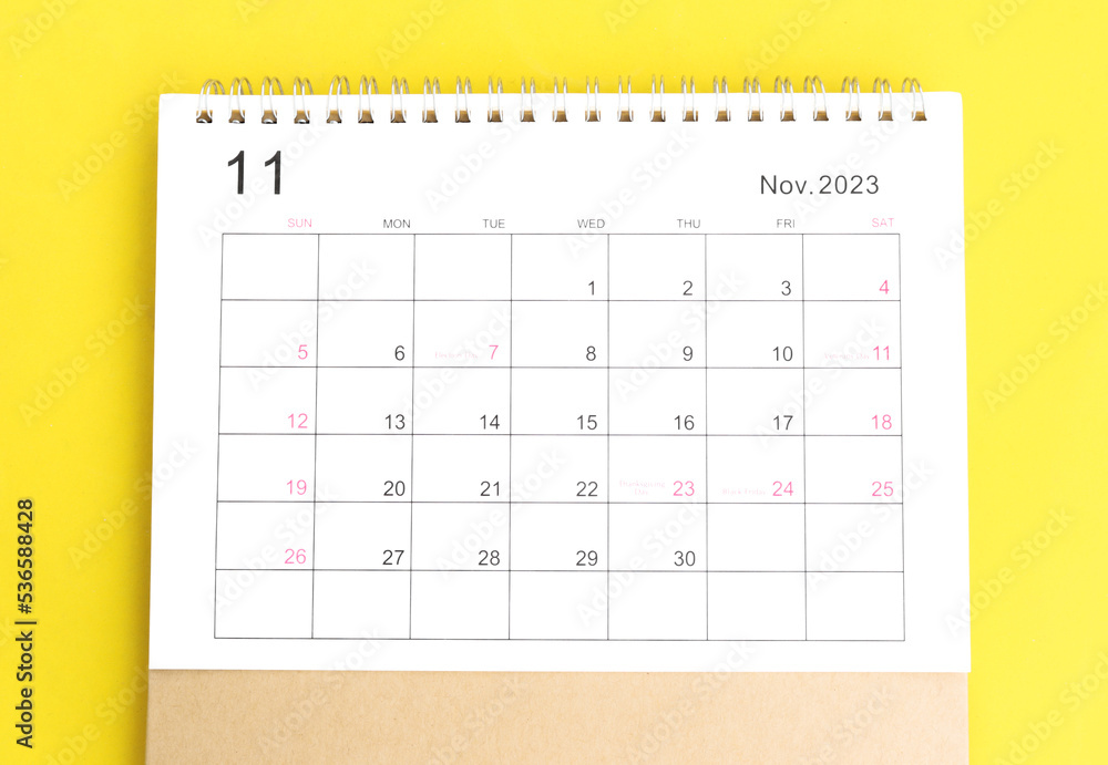 calendar november 2023 top view new year concept on a yellow background calendar november 2023 top view new year concept on a yellow background