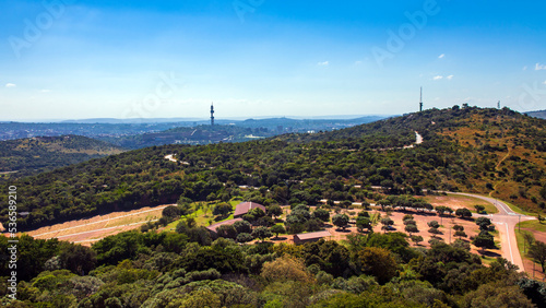View of the city of Pretoria from TV tower in the hilly savannah of Gauteng province. © okyela
