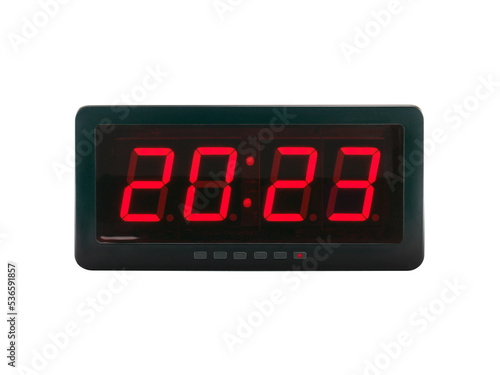 red led light numbers 2023 illuminated on black digital electric alarm clock display isolated on white background, led sign showing time symbol concept for new year countdown