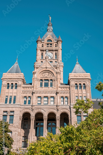 Low angle view of Salt Lake City and County Building. Facade of historic Government landmark with clear blue sky in background. Famous tourist attraction during sunny day.