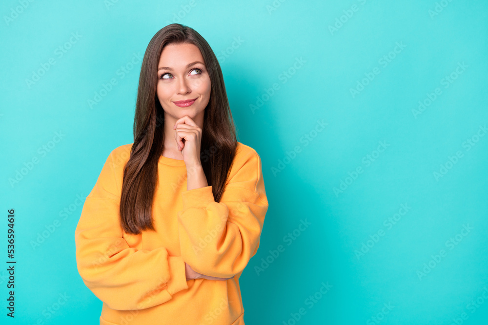 Photo of young adorable pretty attractive nice cute woman touch chin dreamy look empty space information news isolated on cyan color background Photo of young adorable pretty attractive nice cute woman touch chin dreamy look empty space information news isolated on cyan color background