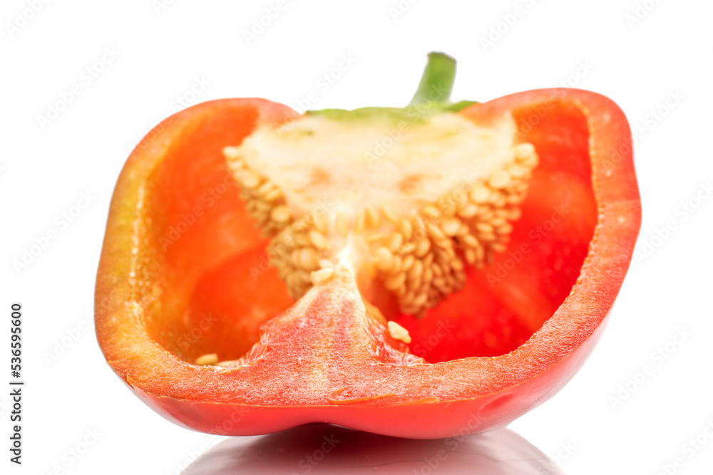 One half of red sweet pepper, close-up, isolated on white. One half of red sweet pepper, close-up, isolated on white.