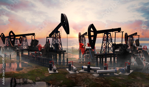 Canvas Print Drilling derricks silhouette from oil field at sunset