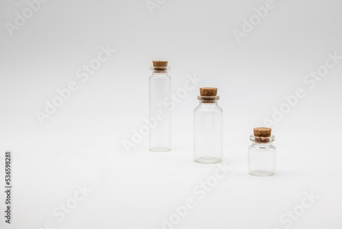 Three empty apothecary bottles. photo