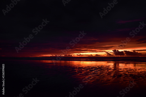 Landscape of sunset at Chaung Tha beach. Cloudy sky. Ending hour at seaside.