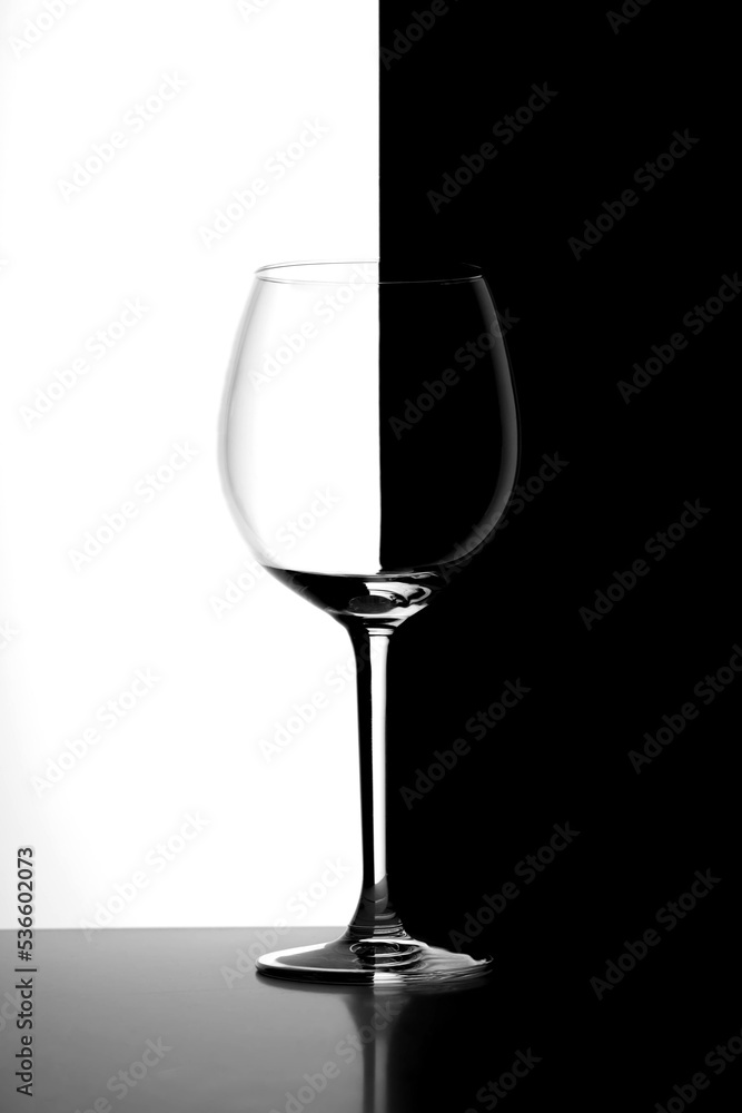 wine glass on black and white