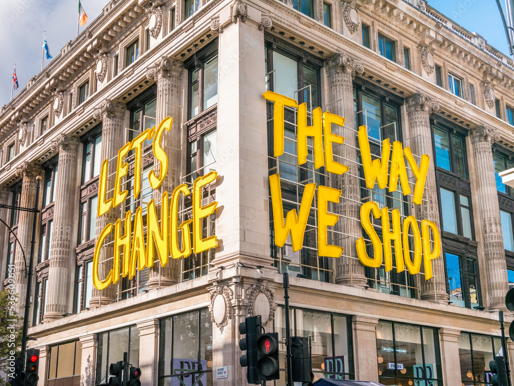 London, UK, October 8th 2022"Let’s Change The Way We Shop" sign is