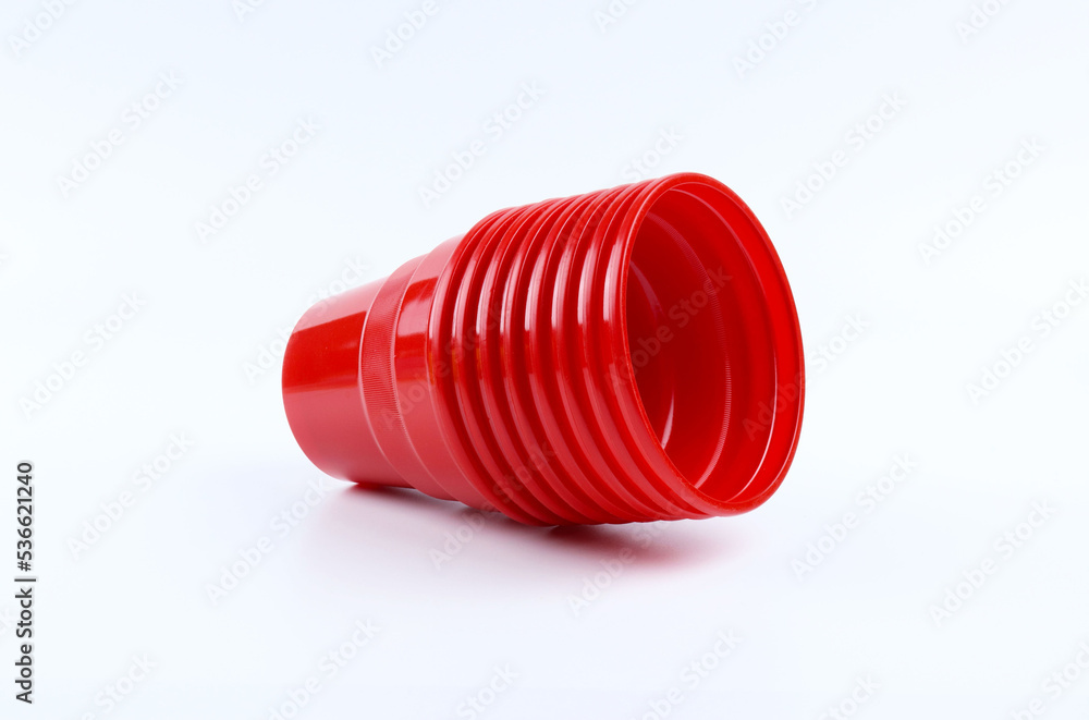 Stack of red plastic cups on white isolated background Stack of red plastic cups on white isolated background