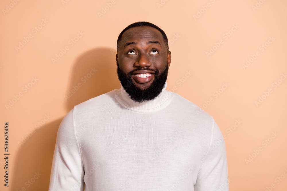 Portrait of funny funky man look up empty space see advert shopping sale isolated pastel color background Portrait of funny funky man look up empty space see advert shopping sale isolated pastel color background