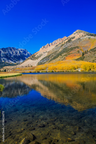 Beautiful fall colors reflection of North Lake near Bishop in Eastern Sierra, the best place to see fall foliage in California