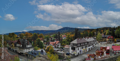 view overlooking the town with picturesque nature in autumn. szklarska poreba, karkonosze, poland