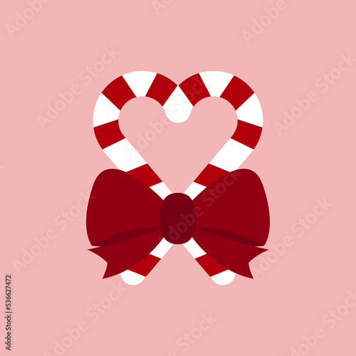 Christmas striped stick candy canes with red bow isoalated on pink background. Red sugar heart in flat style design