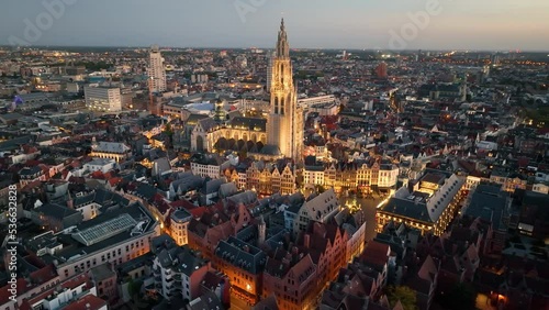 4K Aerial view of cityscape of Antwerp, gothic style landmark Cathedral of Our Lady Antwerp and historic center of city Belgium from above, Europe at night