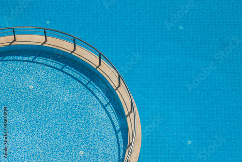 Split blue swimming pool for adults and children,top view © Gulsen