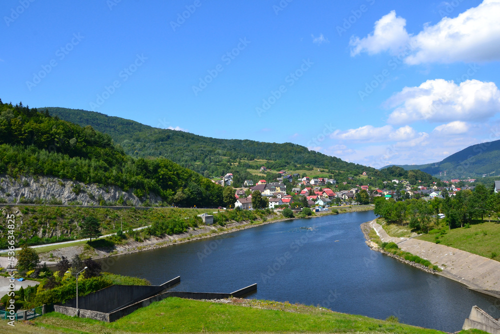 Summer lanscape view from Tresna Dam to Beskid mountains with Sola river and Zar Mount, Poland