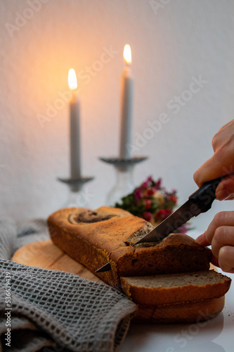 Bananabread and candles on table
