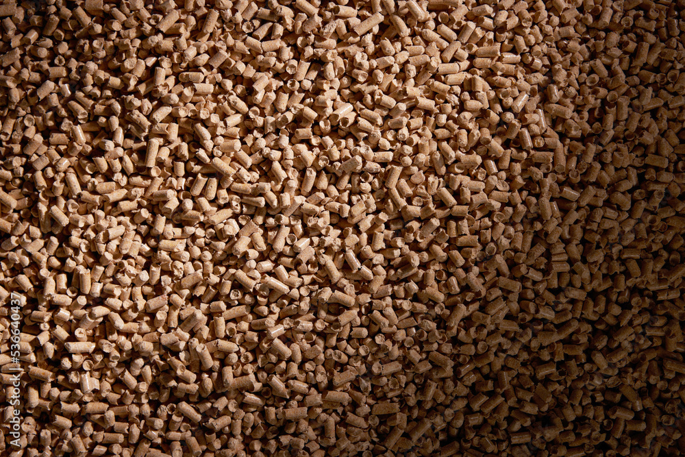 Natural background of heap of wooden pellets Natural background of heap of wooden pellets