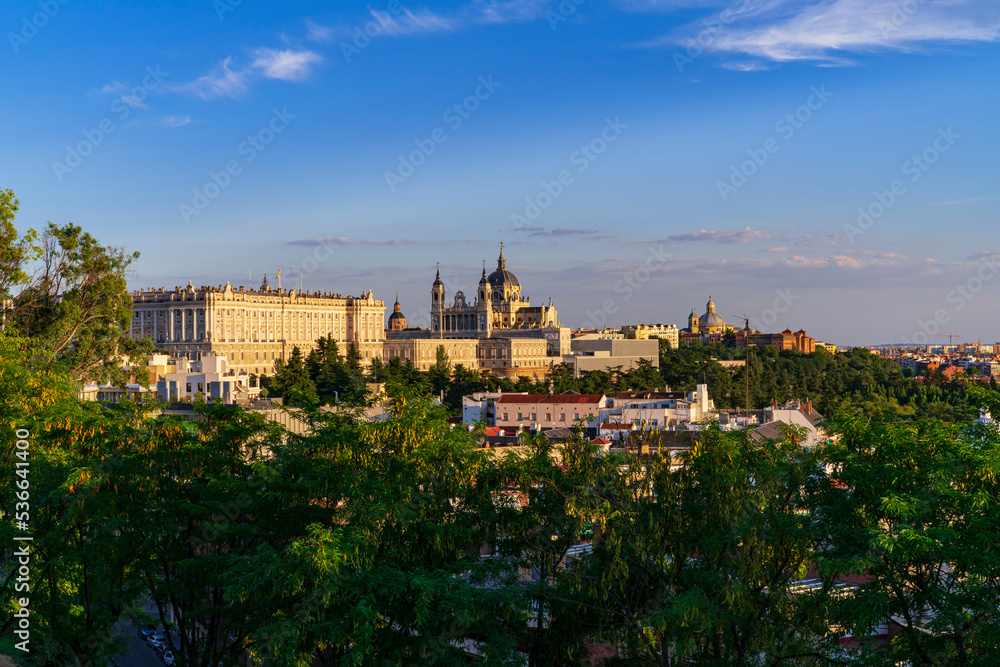 Beautiful views of the Almudena Cathedral and the Royal Palace at sunset. Photography made in Madrid, Spain.