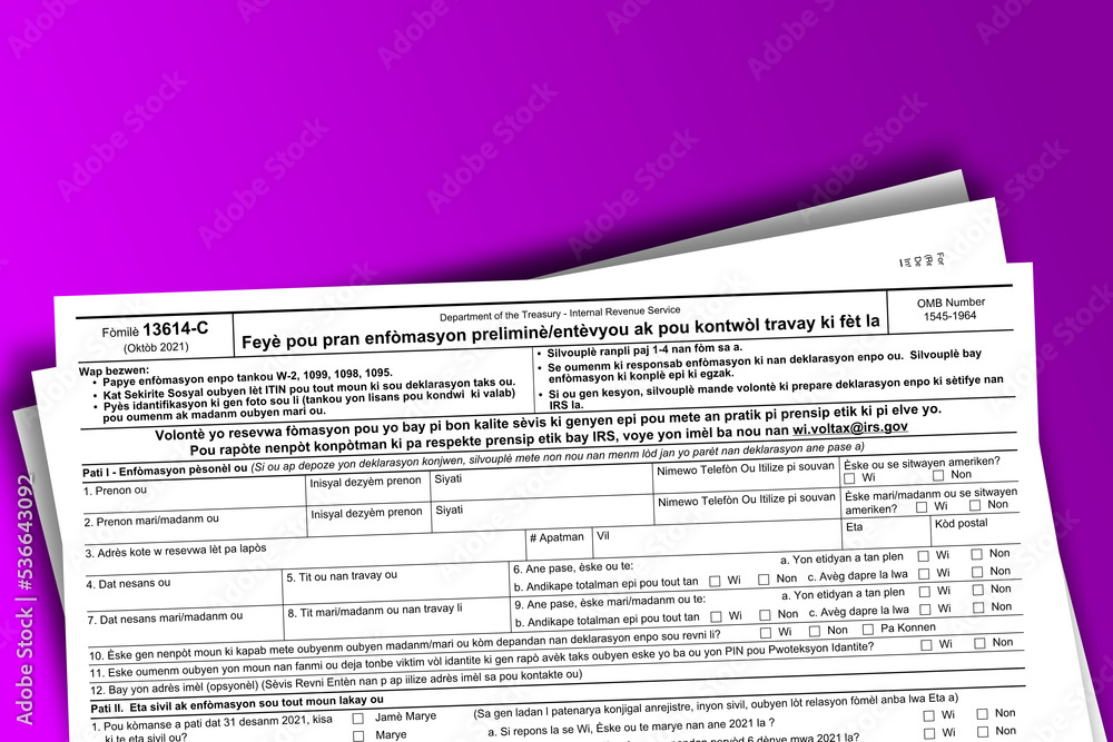 Fototapeta premium Form 13614-C (ht) documentation published IRS USA 44266. American tax document on colored