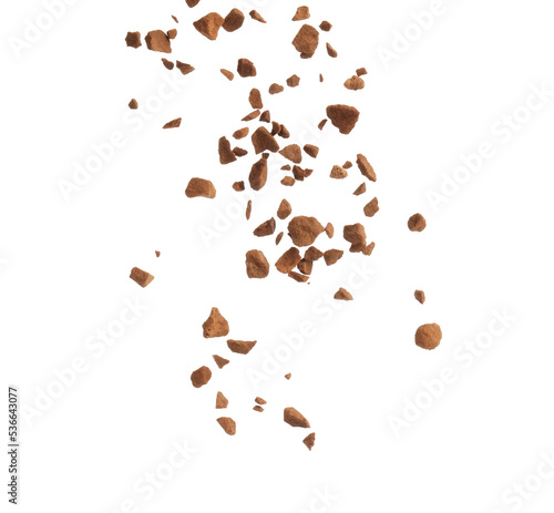 Obraz na płótnie Pouring aromatic instant coffee on white background