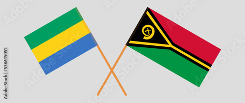 Crossed flags of Gabon and Vanuatu. Official colors. Correct proportion