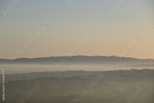 misty sunrise over the mountains