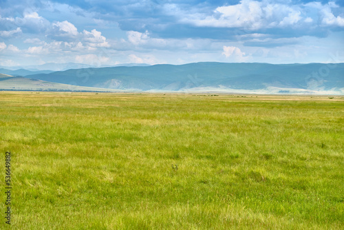 Steppe in the Barguzin Valley of the Republic of Buryatia on a clear sunny day.