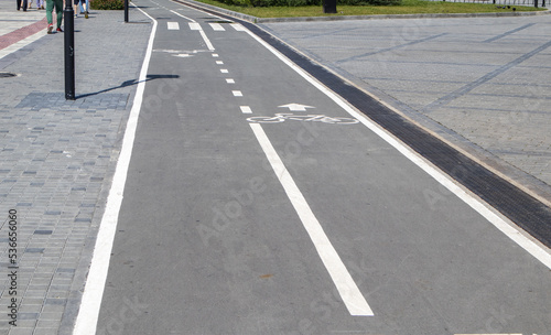 Marking of the traffic lane marking the bike path on the sidewalk