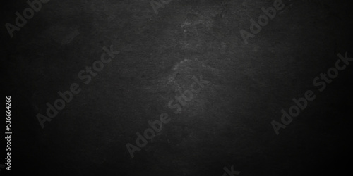 Dark black grunge textured concrete background. Panorama dark grey black slate background or texture. Vector black concrete texture. Stone wall background.	
