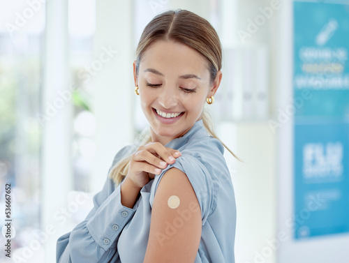 Fototapete Covid, vaccine and plaster with a healthcare woman in a hospital after getting a shot, booster or medical injection
