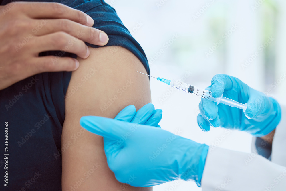 Man, doctor and covid vaccine in arm by hospital, medical and consulting healthcare worker to stop spread of global virus. Zoom, hands and medicine injection in syringe for security and safety Man, doctor and covid vaccine in arm by hospital, medical and consulting healthcare worker to stop spread of global virus. Zoom, hands and medicine injection in syringe for security and safety