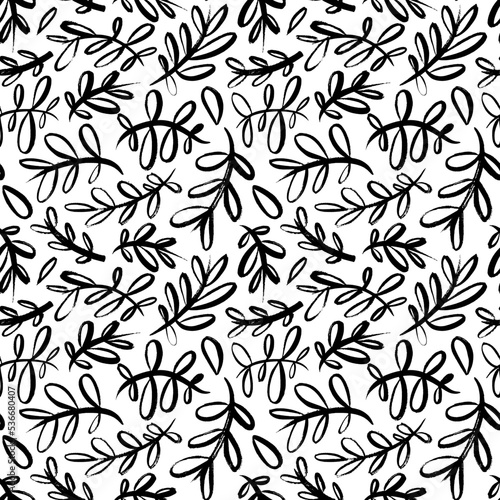 Eucalyptus branches with rounded leaves seamless pattern. Vector black brush drawn branches silhouettes. Black olive leaves and twigs. Natural organic ornament. Monochrome modern background.