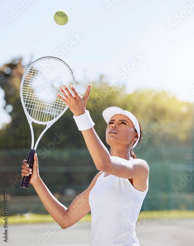 Fototapeta Naklejka Na Ścianę i Meble -  Tennis game, outdoor sports and woman training with energy for sport competition, action on court in summer and motivation for professional event. Athlete player playing and serving for exercise