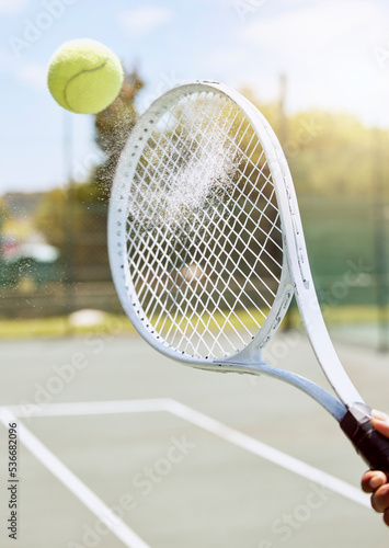 Hand, tennis court and ball game dust action with racket agility in tournament competition macro. Champion athlete equipment for professional match hit and serve on competitive sports ground.