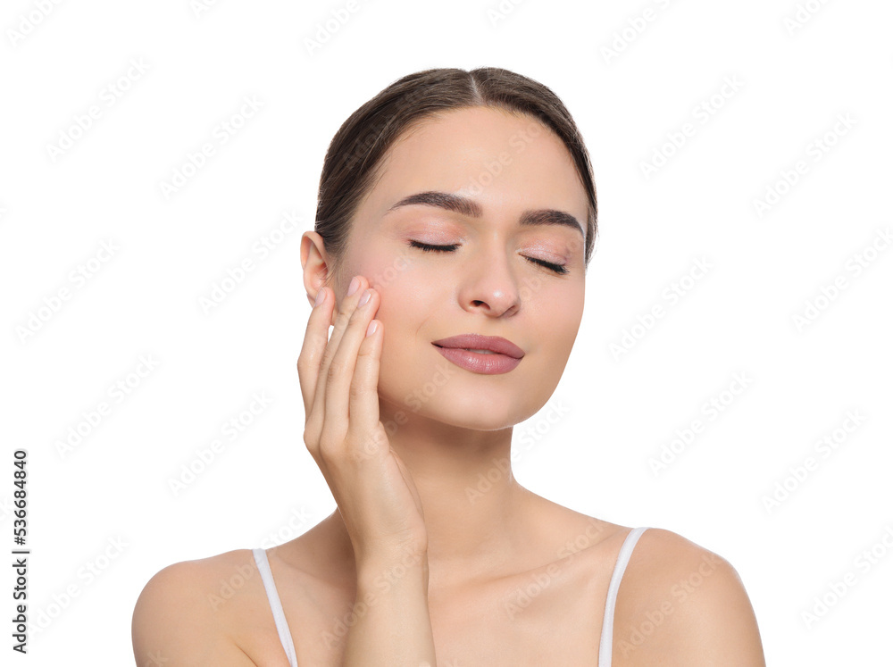 Young woman applying cream under eye on white background Young woman applying cream under eye on white background