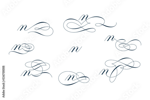 Set of beautiful calligraphic flourishes on letter n isolated on white background for decorating text and calligraphy on postcards or greetings cards. Vector illustration.