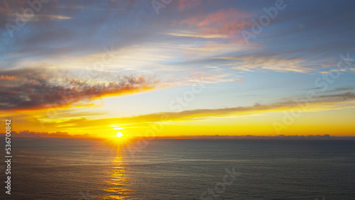 Breathtaking sunset in the calm ocean at the Cabo da Roca  Portugal.