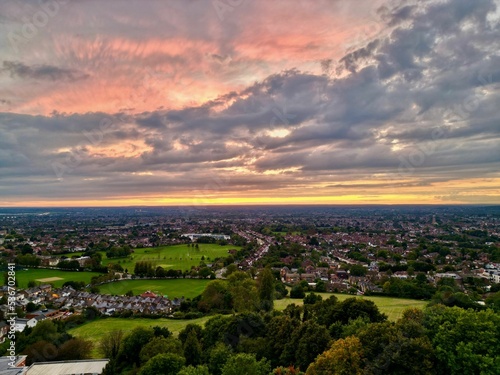 Cityscape of the London Harrow with mesmerizing cloud, United Kingdom, aerial