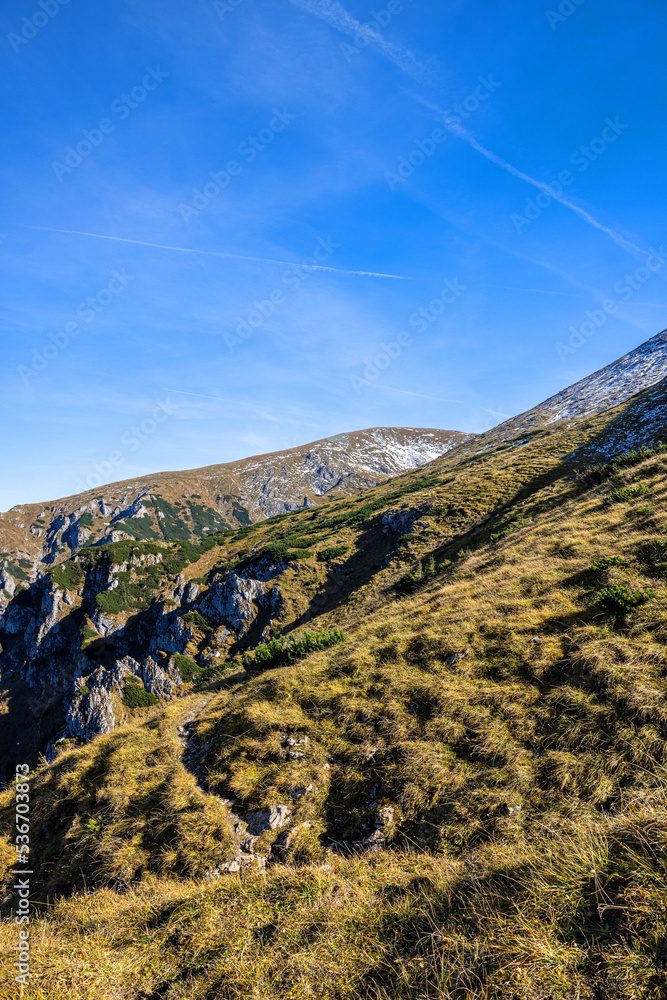 Autumn Mountain Peaks in the Tatra Mountains, Poland, Hiking Adventure Autumn Mountain Peaks in the Tatra Mountains, Poland, Hiking Adventure