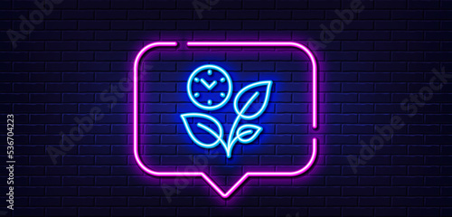 Neon light speech bubble. Leaves line icon. Grow plant leaf sign. Environmental care symbol. Neon light background. Leaves glow line. Brick wall banner. Vector