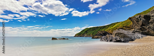 Background image, Cornwall coast in England, long exposure