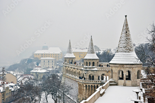 Quadro su tela Fisherman`s Bastion in Budapest, Hungary, during cold snowy and foggy winter day