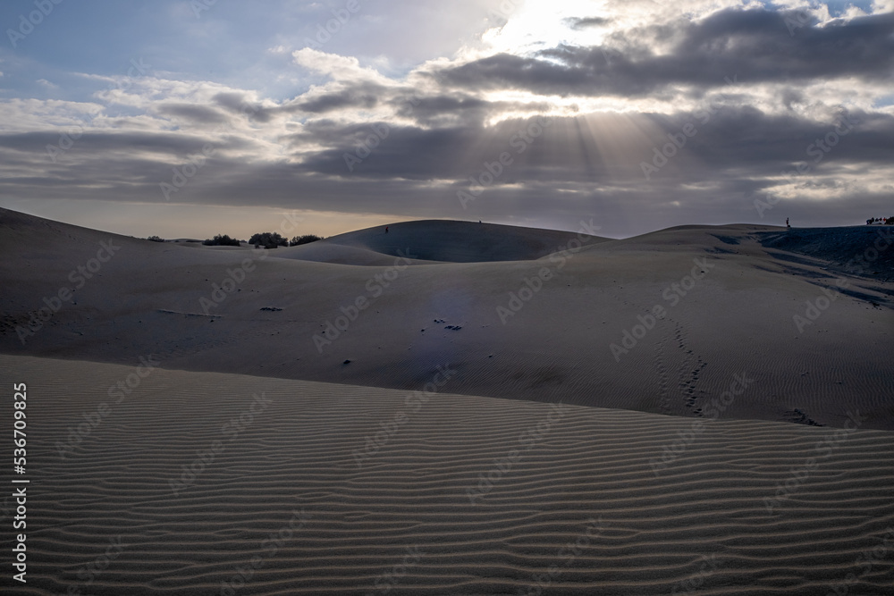sand dunes and clouds