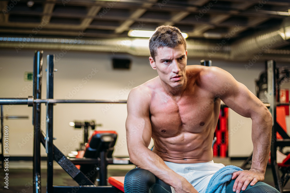 Muscular bodybuilder with towel Muscular bodybuilder with towel