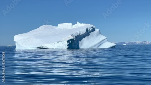 Giant icebergs just off the coast of Disko Island,  near Qeqertarsuaq, Disko Bay, Western Greenland photo