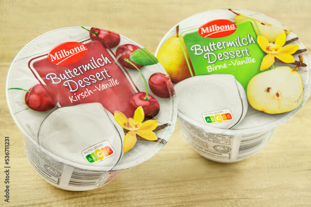 Hamburg, Germany - October 8 2022: Milbona Buttermilch Dessert Birne ... Hamburg, Germany - October 8 2022: Milbona Buttermilch Dessert Birne ...