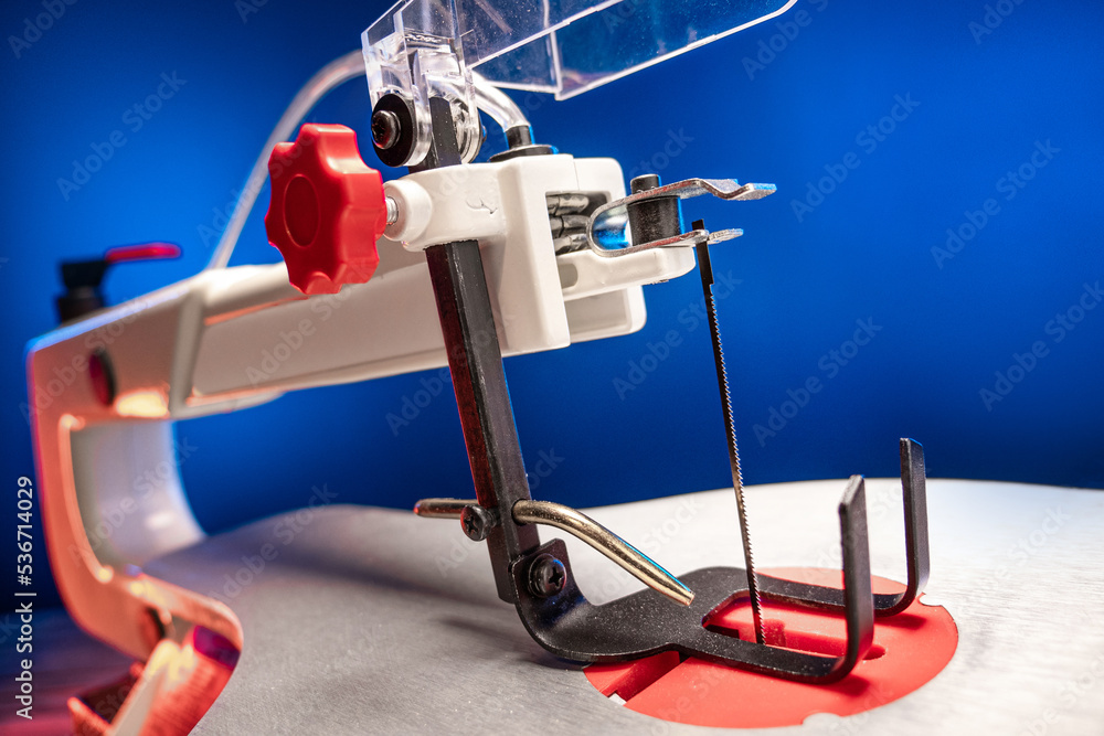 Naklejka premium Jigsaw machine. Wood cutting machine